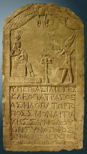 
Cleopatra VII of Egypt dressed like a pharaoh presenting offerings to Isis, 51 BC.Limestone stele dedicated by a Greek man, Onnophris.